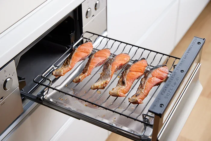 オルシェの焼網で魚を焼いているところ