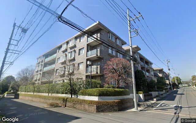 コープ野村緑山ヒルズ弐番館の外観（Googleストリートビュー）