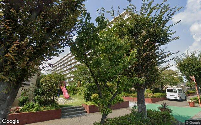 コープ野村南流山弐番街2号棟の外観（Googleストリートビュー）
