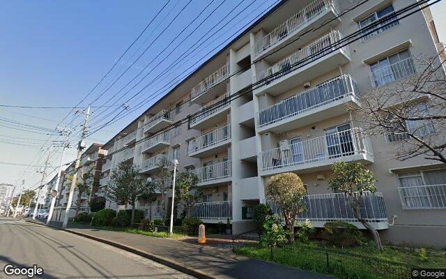 コープ野村志津5号棟の外観（Googleストリートビュー）