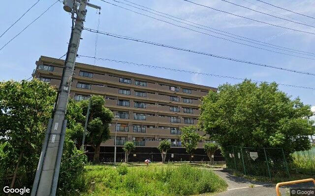 カネボウ交野中央グリーンマンションの外観（Googleストリートビュー）
